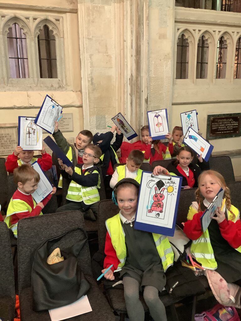 Students partaking in an activity at Rochester Cathedral