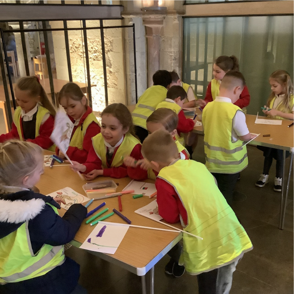 Students partaking in an activity at Rochester Cathedral